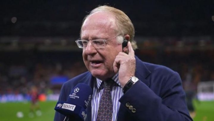 Il presidente del Milan Paolo Scaroni mentre parla all'auricolare